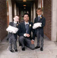 Taylor, Robert, and I at My Wedding 1995